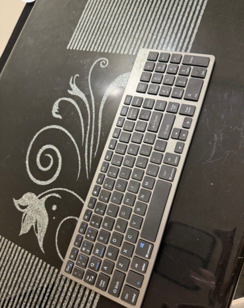 Wireless Keyboard with Numeric Keypad Goojodoq Keyboard (Category: Computer Keyboard) located in Manila. Submitted by zapglnwn (Listing ID 1398155544, Image 2). Description: - Full-size wireless keyboard - Features a numeric keypad - Sleek silver finish - Includes a protective cover - Comes with original packaging - Standard layout with Windows key Goojodoq Wireless Bluetooth Keyboard and Mouse for Laptop keyboard for Android Phone.