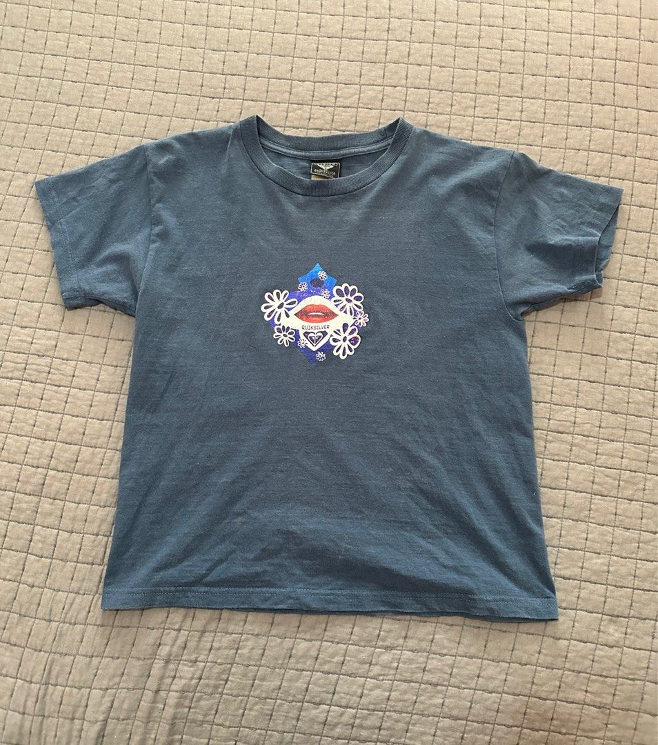 Y2k Quiksilver Graphic Tee (Category: Shirts) located in Las Pinas. Submitted by essentialsbyj (Listing ID 1398061691, Image 1). Description: Y2k Quiksilver Graphic Tee Size: XS to Small Dimensions: 16.5W x 21L Great condition No issues All sales final no refunds no returns no exchange *color may vary due to lighting* 📍Las Pinas area (df shouldered by buyer) .
