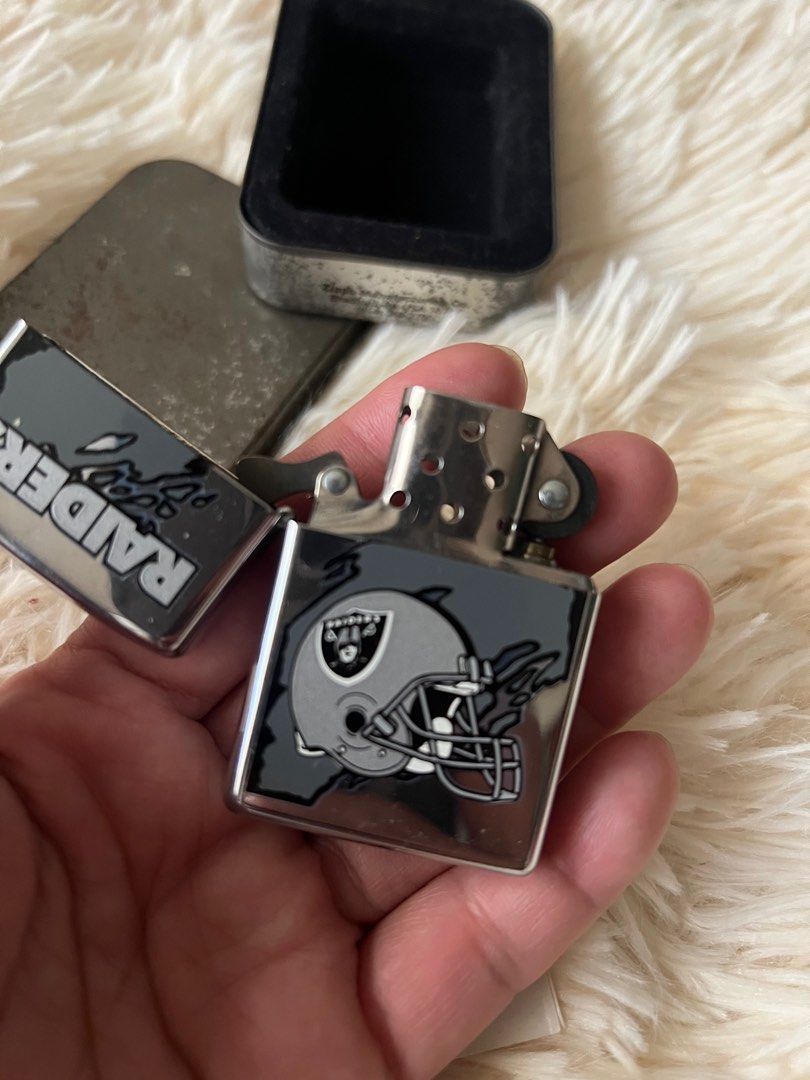 1997 Vintage Raiders Zippo Lighter (Category: Vintage Collectibles) located in Baguio. Submitted by Pampolina2600 (Listing ID 1398236714, Image 2). Description: Collectors Item Vintage Raiders Windproof Zippo Lighter New .