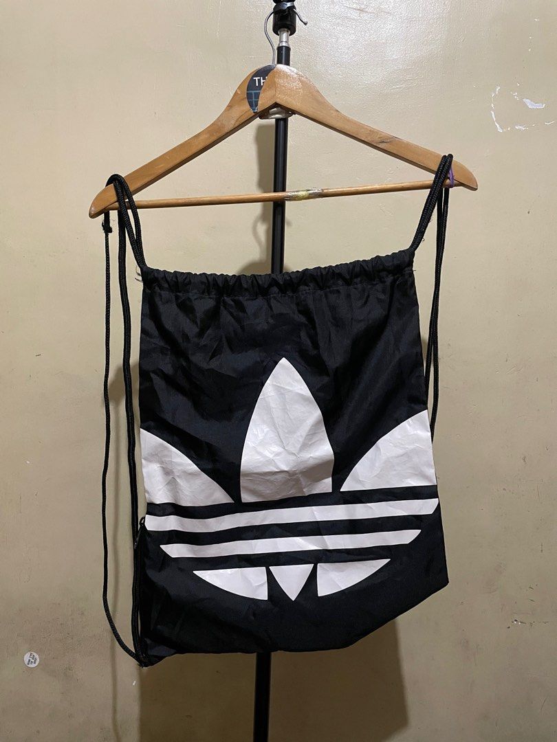 ADIDAS (Category: Backpacks) located in Iligan City. Submitted by thriftoukay2020 (Listing ID 1398228709, Image 3). Description: ADIDAS STRING BAG DIMENSION 13x18 VERYGOOD CONDITION CR 9.5/10 MINE 300+sf✈️✈️ MOP:GCASH DM TO PURCHASE📩📩.