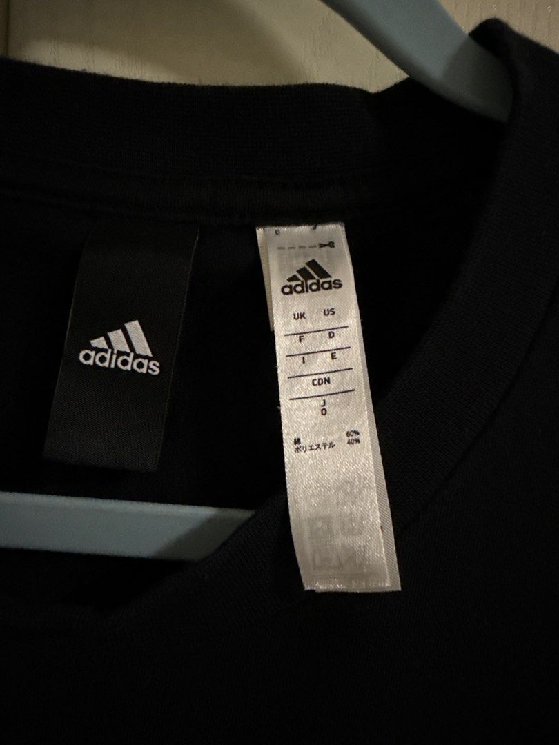Adidas Tokyo T-shirt (Category: Tshirts & Polo Shirts ) located in Makati City. Submitted by dpfran (Listing ID 1398188741, Image 2). Description: - Adidas Tokyo T-shirt - Color: Black - Material: Polyester - Design: Adidas logo and "TOKYO" print on the front - Neckline: Crew neck - L: 27.5”, W: 16.5” - Sleeves: Short sleeves.