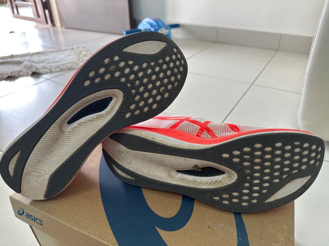Asics Magic Speed 3 - White/Sunrise Red - US 11 (Category: Sneakers) located in Singapore. Submitted by dickson927 (Listing ID 1398171986, Image 3). Description: - Asics Magic Speed 3 running shoes - US size 11 - Color: White and sunrise red - Includes original box.