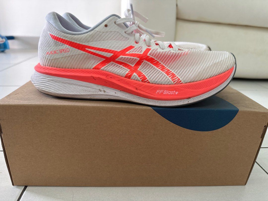 Asics Magic Speed 3 - White/Sunrise Red - US 11 (Category: Sneakers) located in Singapore. Submitted by dickson927 (Listing ID 1398171986, Image 1). Description: - Asics Magic Speed 3 running shoes - US size 11 - Color: White and sunrise red - Includes original box.