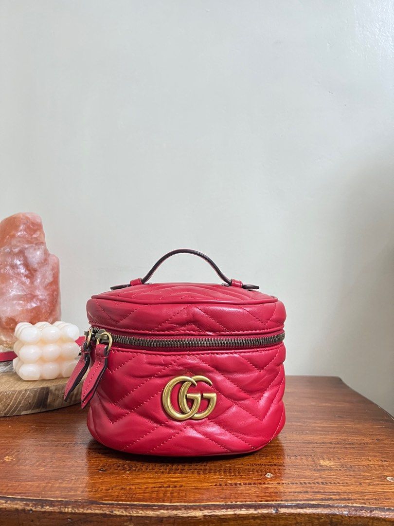 Auth Gucci GG Marmont Mini Matelasse Backpack (Category: Luxury Bags & Wallets) located in Manila. Submitted by iaaaaamtc (Listing ID 1398201974, Image 1). Description: - Authentic - Crafted in red leather - Features: - Quilted heart design - Double G logo - Top handle - Zip closure - Beige interior lining With COA.