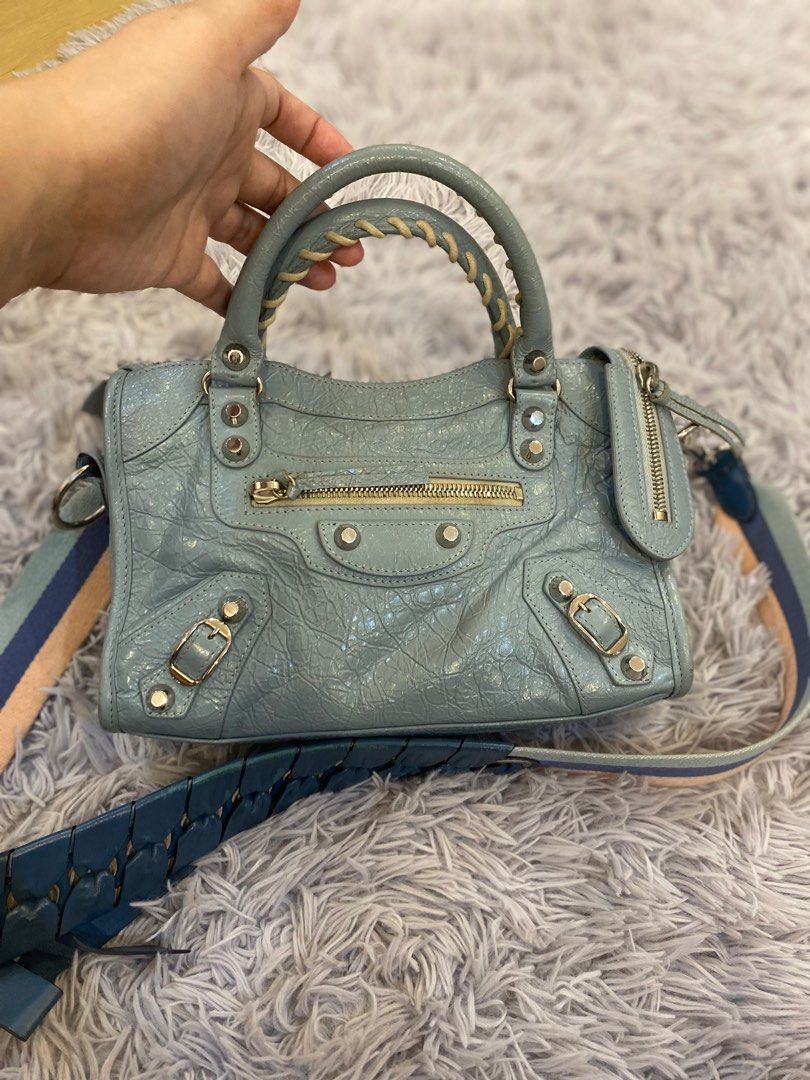 Authentic Balenciaga mini city giant 12 (Category: Luxury Bags & Wallets) located in Angeles City. Submitted by graiqs (Listing ID 1398313377, Image 3). Description: Authentic Bal3nciaga mini city agneau Giant 12 bleu silver hardwares matched with pretty multi-color authentic f3ndi strap (worth ₱15K)! 🩵 so adorable & so cutesy! Fresh pastel colors that’l surely brighten up your day with this bag! ✨ .