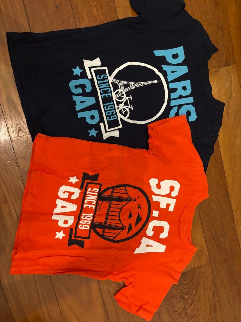 Authentic GAP (Category: Babies & Kids Fashion) located in Singapore. Submitted by lene11 (Listing ID 1398284759, Image 1). Description: Authentic GAP tops for boy from USA Lightly worn, great condition 1/ red one size 4 years old (worn 5-6x only) 2/ black one size 5 years old (worn 5-6x only) $10 for both with free normal mailing, not responsible of missing mail $8 for both, self collect at Novena, 5 mins walking from Novena MRT No return, no re
