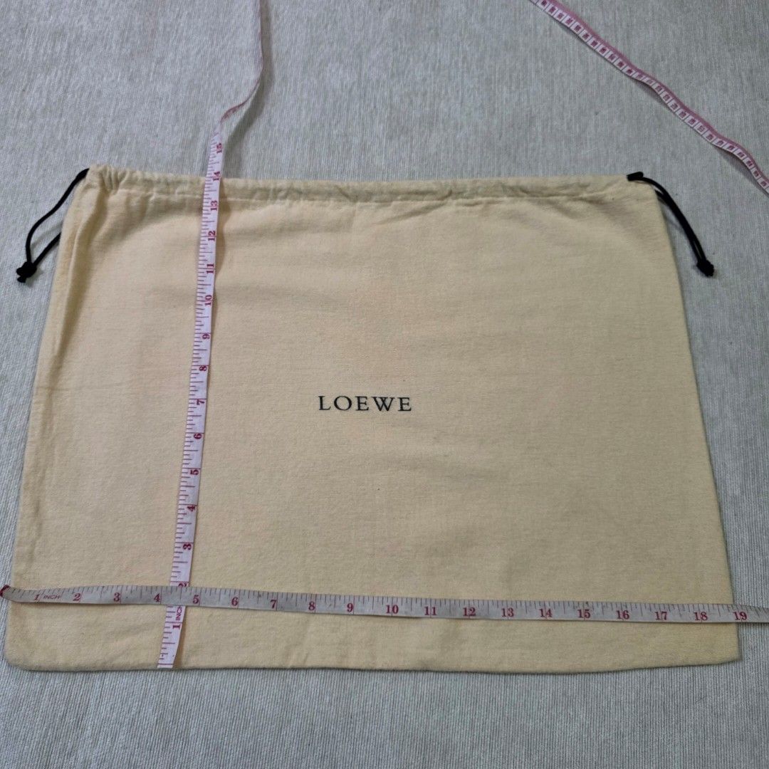 Authentic Loewe dust bag 14x19 inchez (Category: Tote Bags) located in Manila. Submitted by jfluxury.co (Listing ID 1398299318, Image 3). Description: excellent condition no flaws bought in Japan 🇯🇵 💯% Authentic. 😊 Money back guarantee. 😊 Clean and ready to use na.
