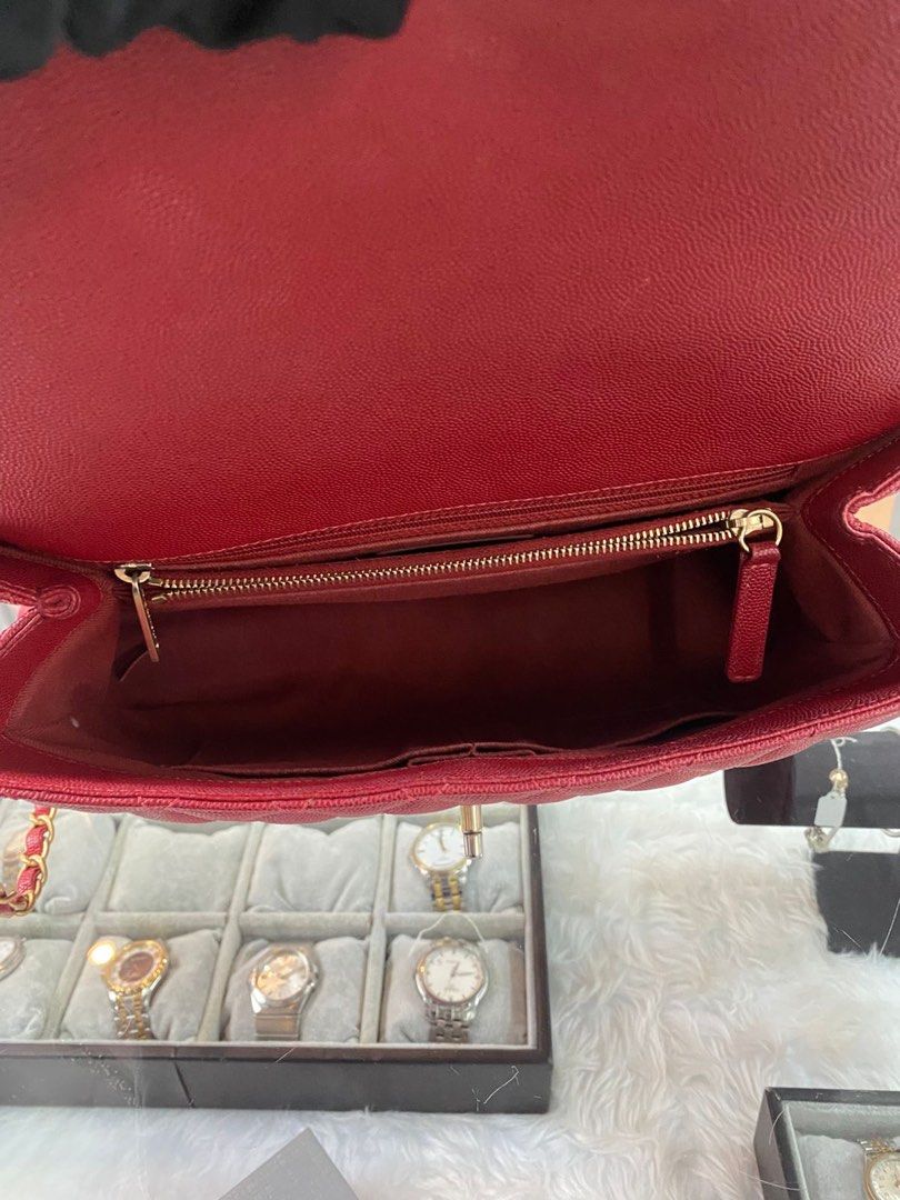 Chanel Red Quilted Top Handle Bag (Category: Luxury Bags & Wallets) located in Rodriguez. Submitted by nancyb13 (Listing ID 1398244411, Image 3). Description: -Caviar Leather top handle -One zip pocket two opwn pockets -One pen pocket one zip compartment - Two main compartments -measurement 11.5”L X 4.5”W X 8”H.