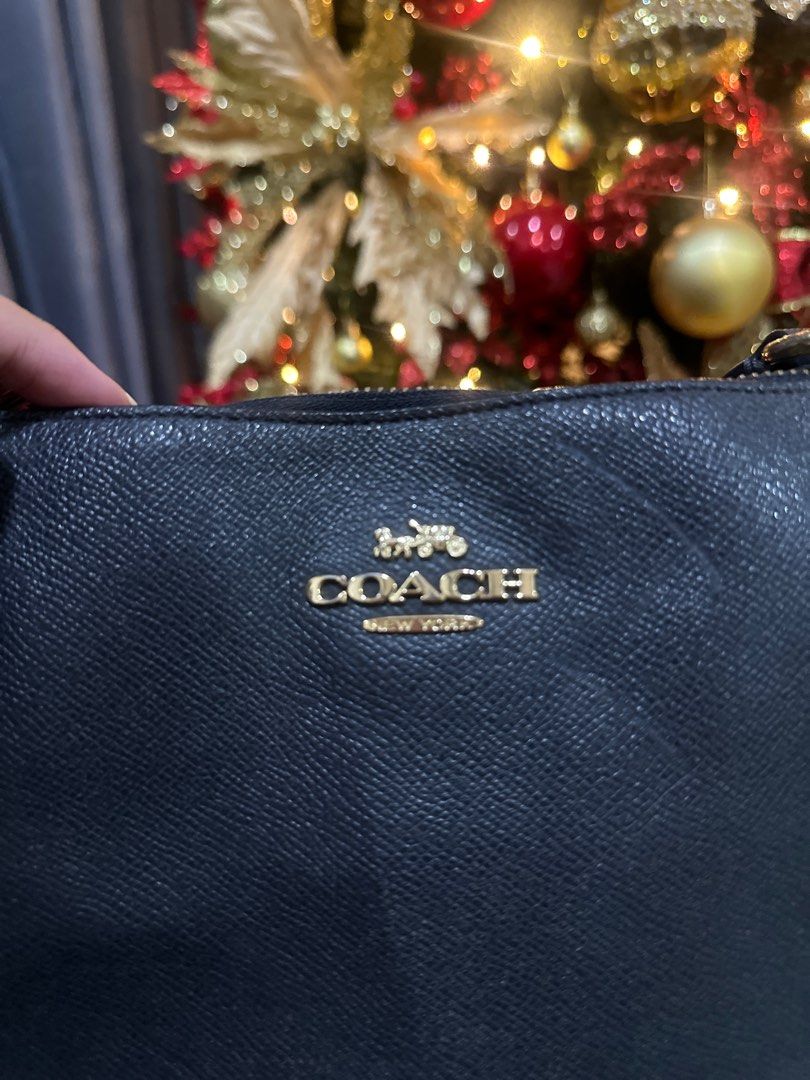 Coach Ava Tote (Category: Luxury Bags & Wallets) located in Batangas. Submitted by madrivcab (Listing ID 1398335264, Image 3). Description: Coach Ava Tote Perfect as a work/school bag. Personally bought by my husband in Canada. All zippers working. Gold hardware. Lightly used. Flaws: Minor imperfection on the inside “Coach” tag (barely noticeable and common for Coach bags). Small burn mark at the back from a hair iron during a salon visit — not o