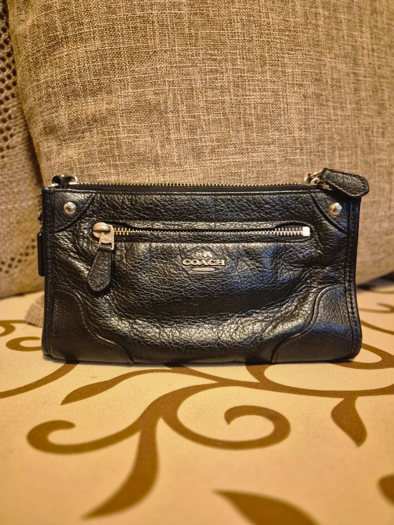 Coach Black Chain Wallet (Category: Luxury Bags & Wallets) located in Quezon City. Submitted by jermiahh (Listing ID 1398037414, Image 3). Description: - Black Coach chain wallet - Silver chain strap - Zipper closure - Coach logo on front - Leather material - Slim design.