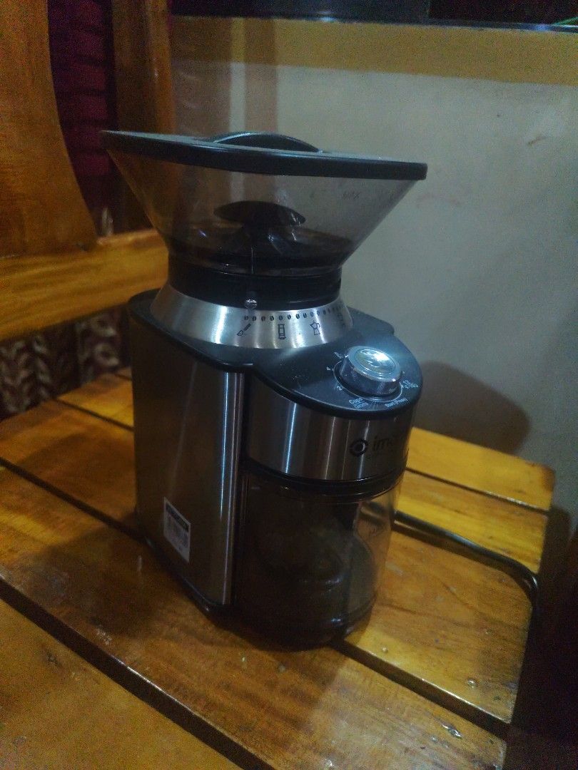 Coffee Grinder (Category: Coffee Machines & Makers) located in Davao. Submitted by violentino74125 (Listing ID 1398336382, Image 1). Description: - for optimal coffee grinding. - Grind settings for various brewing methods. - Volume settings for precise measurements. - Clear container to monitor ground coffee. - Simple start button for easy operation. USED JUST 1 WEEK.