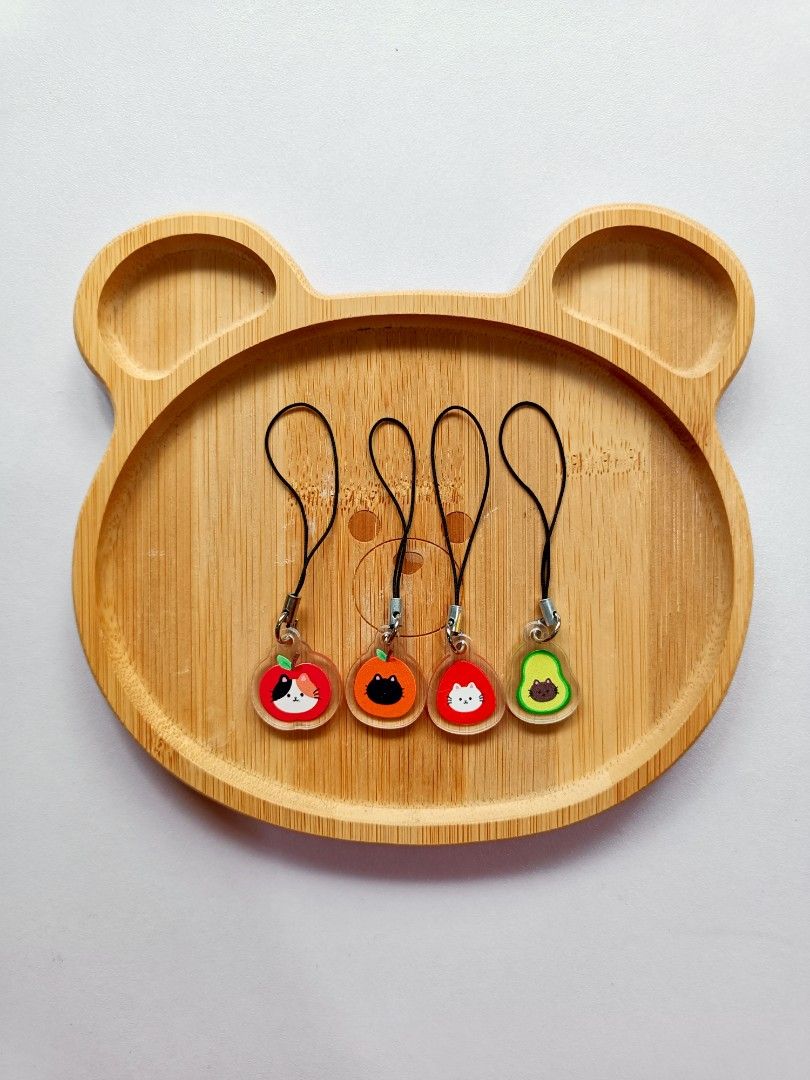 Cute Fruit Cat Phone Charms (Category: Charms) located in San Juan City. Submitted by misodoobee (Listing ID 1398246155, Image 1). Description: Cute fruit cat phone charms 🍒 - Designs: Apple, strawberry, orange, and avocado - Perfect for phones and accessories - Price: P75 each MOP: Gcash/BPI/BDO Loc: San Juan Delivery via Lalamove or JNT.