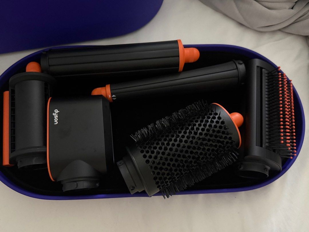 Dyson AirWrap i.d. Straight+Wavy (Category: Hair Accessories) located in Marikina City. Submitted by laraxxvi (Listing ID 1398180965, Image 3). Description: Dyson Airwrap in Topaz Blue Bought Feb 2025 Dyson online store. Only used a few times. In very good condition as seen in pictures. Only used 2 barrels, the rest of accessories untouched. Original Price: Php36,900 Price Non-negotiable. .