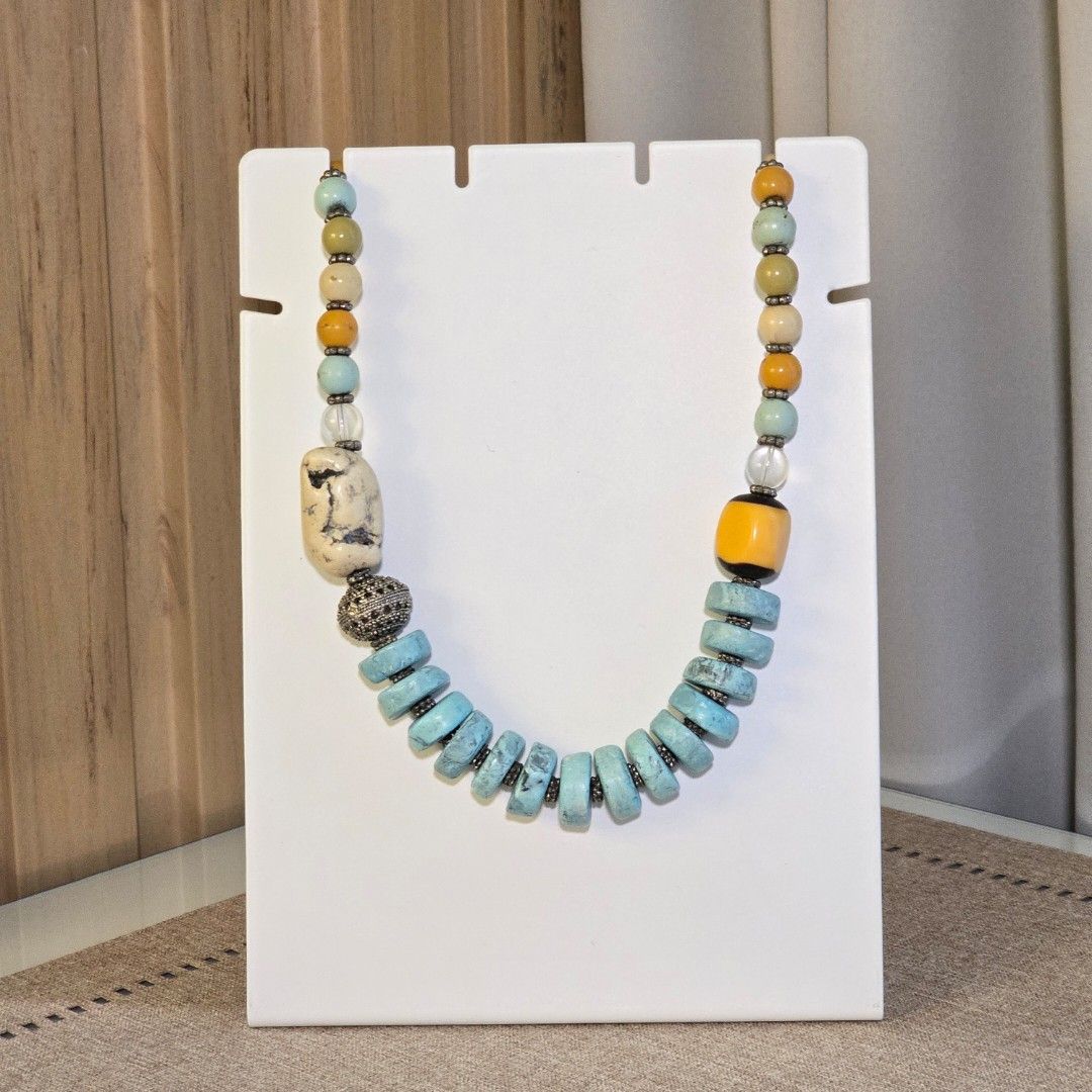 Eclectic Bohemian Turquoise Stone Bead Necklace (Category: Necklaces) located in Makati City. Submitted by midnight.market (Listing ID 1398269965, Image 1). Description: ♡ Eclectic Bohemian Turquoise Stone Bead Necklace ♡ Features turquoise, yellow, and cream beads ♡ Unique design with flower-shaped clasp ♡ Chunky and a bit heavy ♡ Antique has been stored for more than a decade, no signs of tarnishing ♡ RFS: Decluttering.
