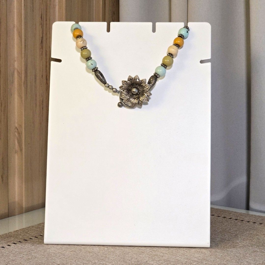 Eclectic Bohemian Turquoise Stone Bead Necklace (Category: Necklaces) located in Makati City. Submitted by midnight.market (Listing ID 1398269965, Image 2). Description: ♡ Eclectic Bohemian Turquoise Stone Bead Necklace ♡ Features turquoise, yellow, and cream beads ♡ Unique design with flower-shaped clasp ♡ Chunky and a bit heavy ♡ Antique has been stored for more than a decade, no signs of tarnishing ♡ RFS: Decluttering.