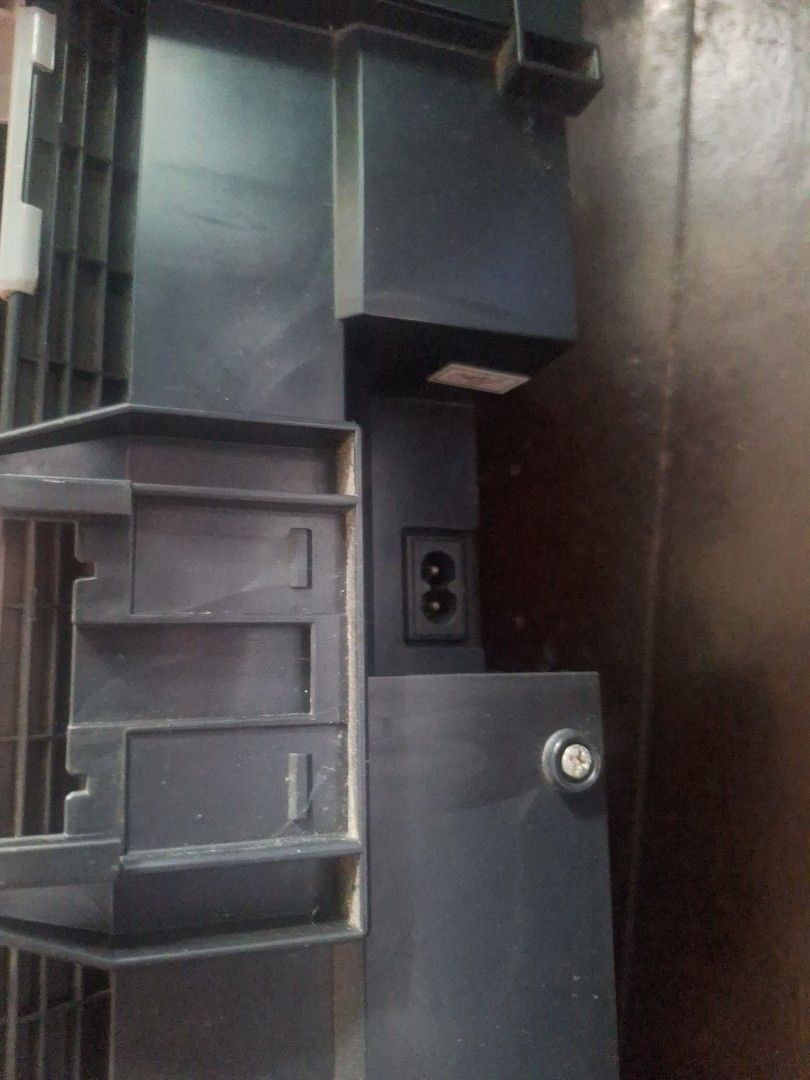 Epson L120 Ink Tank Printer (Category: Printers, Scanners & Copiers) located in Manila. Submitted by elboh79270 (Listing ID 1398191520, Image 2). Description: - Epson ink tank printer - Black exterior - Power port included - Ink tanks: blue, red, yellow, black - Epson logo on front.