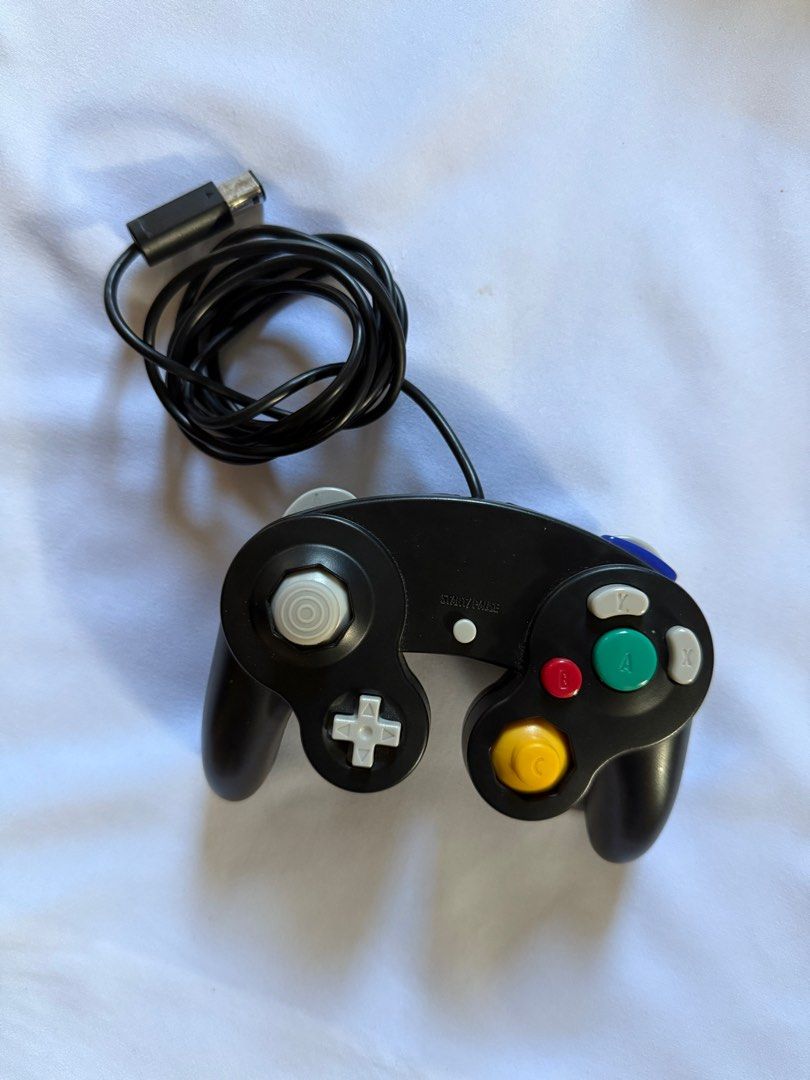 Gamecube and Wii controller (Set) (Category: Nintendo) located in Cagayan de Oro. Submitted by mentallyfatigue (Listing ID 1398268334, Image 3). Description: - No issues - Plug and play to your Wii or GameCube - GameCube controller compatible for Nintendo Wii too.