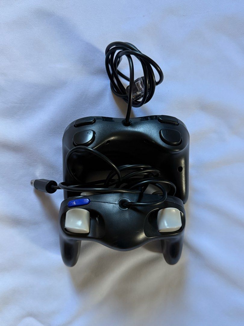 Gamecube and Wii controller (Set) (Category: Nintendo) located in Cagayan de Oro. Submitted by mentallyfatigue (Listing ID 1398268334, Image 2). Description: - No issues - Plug and play to your Wii or GameCube - GameCube controller compatible for Nintendo Wii too.