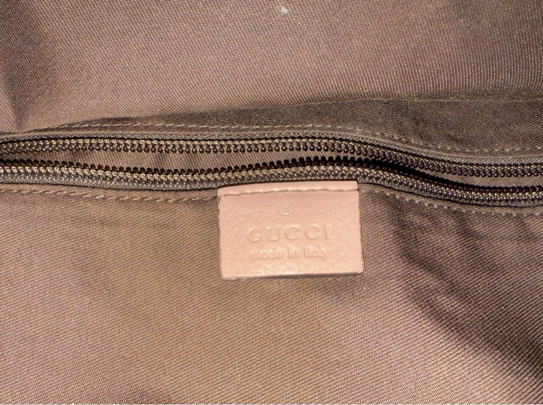 Gucci GG Canvas duffle Bag (Category: Luxury Bags & Wallets) located in Manila. Submitted by adanielbm (Listing ID 1398214564, Image 2). Description: - Authentic Gucci duffle bag - Iconic GG canvas pattern - Secure zip closure - Spacious interior - Color scheme: Light green, beige, light blue, white, and brown - Made in Italy.