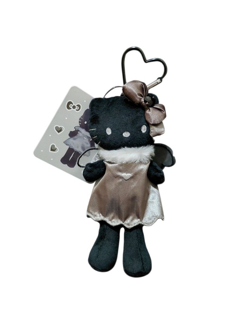 Hello Kitty Black Angel Plush Charm (Category: Plushies & Soft Toys) located in Navotas City. Submitted by sanrio_galore (Listing ID 1398341566, Image 1). Description: Are you a Hello Kitty collector that's a bit tight on budget? Want something that's affordable and yet has good quality? Introducing the New black gogogal-inspired kitty mascots! ■still open for Pre-order ■NOT sanrio licensed but definitely has good quality and style ■price mention