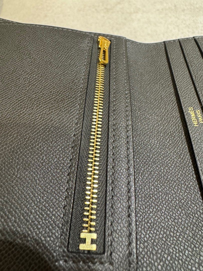 Hermes Bearn Compact Wallet (GHW) 🩶 (Category: Luxury Bags & Wallets) located in Manila. Submitted by hellonixxx (Listing ID 1398313878, Image 3). Description: Color: Graphite (Dark Gray 🩶) / GHW Very nice color 🫶🏻 Compact wallet in Madame calfskin - Leather tab with openwork “H” closure - Zipped change purse - 4 credit card slots - 4 pockets - Bill pocket.