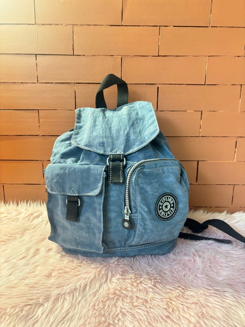 Kipling Vintage Mini Backpack (Category: Backpacks) located in Las Pinas. Submitted by kcs_closet (Listing ID 1398221580, Image 1). Description: Slightly negotiable Can fit Ipad 10, can put a lot of stuff With 2 pockets in front Zipper on right side (access inside) 3 ballpen pockets on left side Intact zippers Includes monkey keychain Original RFS: Decluttering .