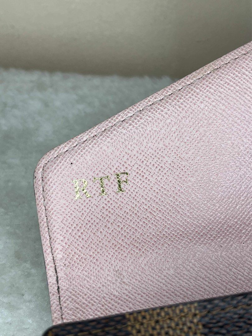 Louis Vuitton Damier Ebene Sarah Wallet (Category: Luxury Bags & Wallets) located in Manila. Submitted by besa8 (Listing ID 1398293570, Image 2). Description: - Authentic Louis Vuitton Sarah Wallet - Damier Ebene canvas - Pink leather interior - Multiple card slots and compartments - Includes original box, dust bag, and receipt - Initials "RTF" embossed inside - Made in Spain - Date code: CA3198.