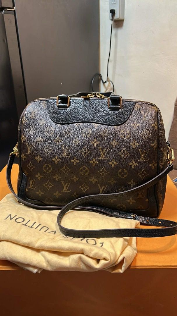 Louis Vuitton Monogram Handbag with Strap (Category: Luxury Bags & Wallets) located in Caloocan City. Submitted by piamariemo11606 (Listing ID 1398332750, Image 2). Description: - Authentic Louis Vuitton handbag - Iconic monogram pattern - Top handle and detachable shoulder strap - Black leather trim - Gold-tone hardware - Includes dust bag.