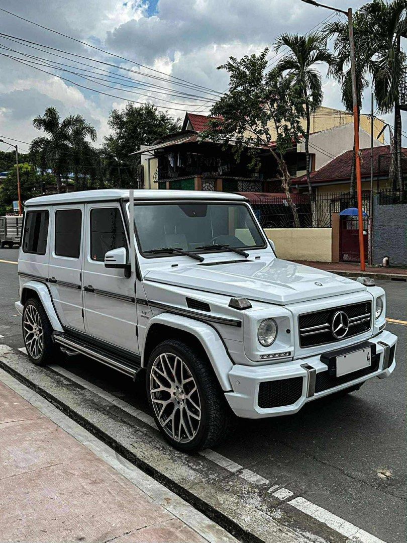 Mercedes-Benz G-Class AMG Auto (Category: Used Cars) located in Manila. Submitted by quality_cars (Listing ID 1398221404, Image 2). Description: FOR SALE‼️ 2016 Mercedez Benz G-Class AMG All stock original Setup -Stock 5.5-Liter twin turbo V8 Gas -All Wheel Drive -Original 16k mileage -7 speed automatic transmission Honest issue: naka wrap siya ng white, original color is blue, and still has the original blue color underneath. Can be remove profe