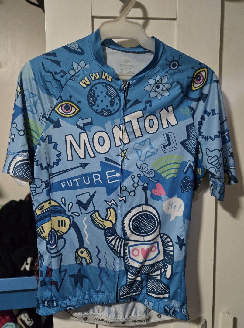 Monton Cycling Jersey (Category: Bicycles) located in Quezon City. Submitted by ddlry (Listing ID 1398255256, Image 1). Description: - Monton cycling jersey - Short sleeves - Features a "Future" robot graphic - Perfect for cycling -Size M.