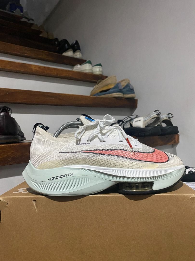 Nike Alphafly Next% 8.5 (Category: Sneakers) located in Antipolo. Submitted by bentakahitanoano (Listing ID 1398340054, Image 1). Description: Nike Air Zoom Alphafly NEXT% Size: US 8.5 Condition: Still wearable — with minor issues as shown in the photos. Small snag/damage on knit upper (has been fixed) Note: Has a repaired knit damage, but still fully wearable and ready to run or race. Lightweight, high-performance running shoes designed for spee