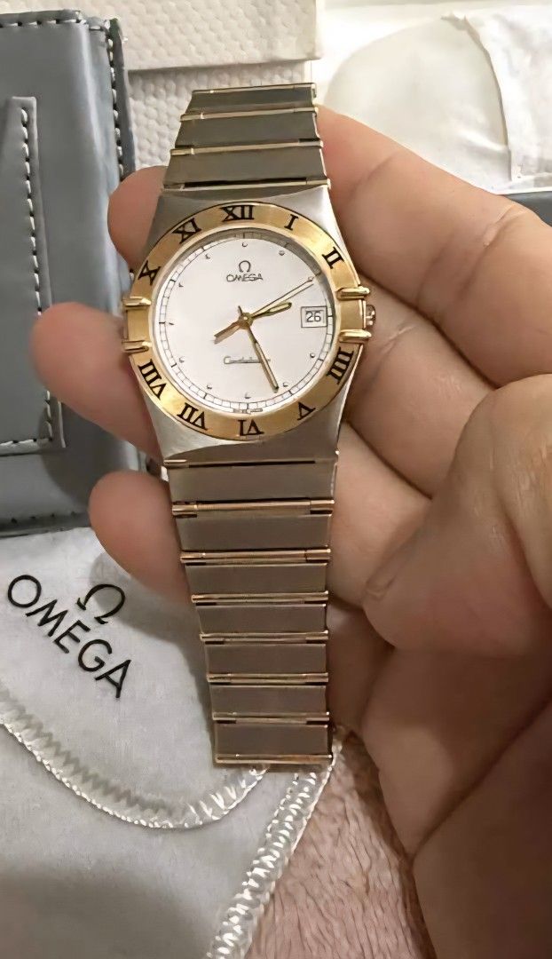 Omega Constellation Watch (Category: Luxury Watches) located in Quezon City. Submitted by mightywind.4469d6 (Listing ID 1398344111, Image 1). Description: - Omega Constellation watch - White dial with gold-tone accents - Stainless steel and gold-tone bracelet - Includes original box - Includes warranty card - Includes extra links.