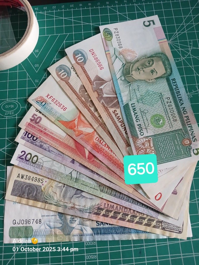 Philippine Peso Bills - Assorted Denominations (Category: Currency) located in Angono. Submitted by aldrianvillareal28 (Listing ID 1398229725, Image 1). Description: - Assorted Philippine Peso bills - Total value: ₱650 - Denominations: 5, 10, 20, 50, 100, 200 - Year: 2025 - Serial numbers visible - Perfect for collectors.
