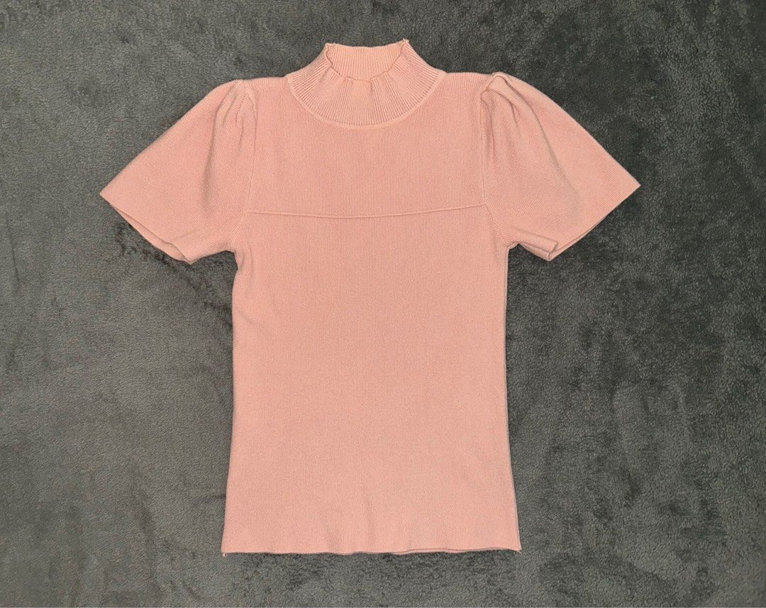 Pink Short Sleeve Top (Category: Blouses) located in Binan City. Submitted by mid.elle (Listing ID 1398214926, Image 1). Description: - Pink top - Mock neck - Short, puffed sleeves - Knit fabric -See when worn photo .