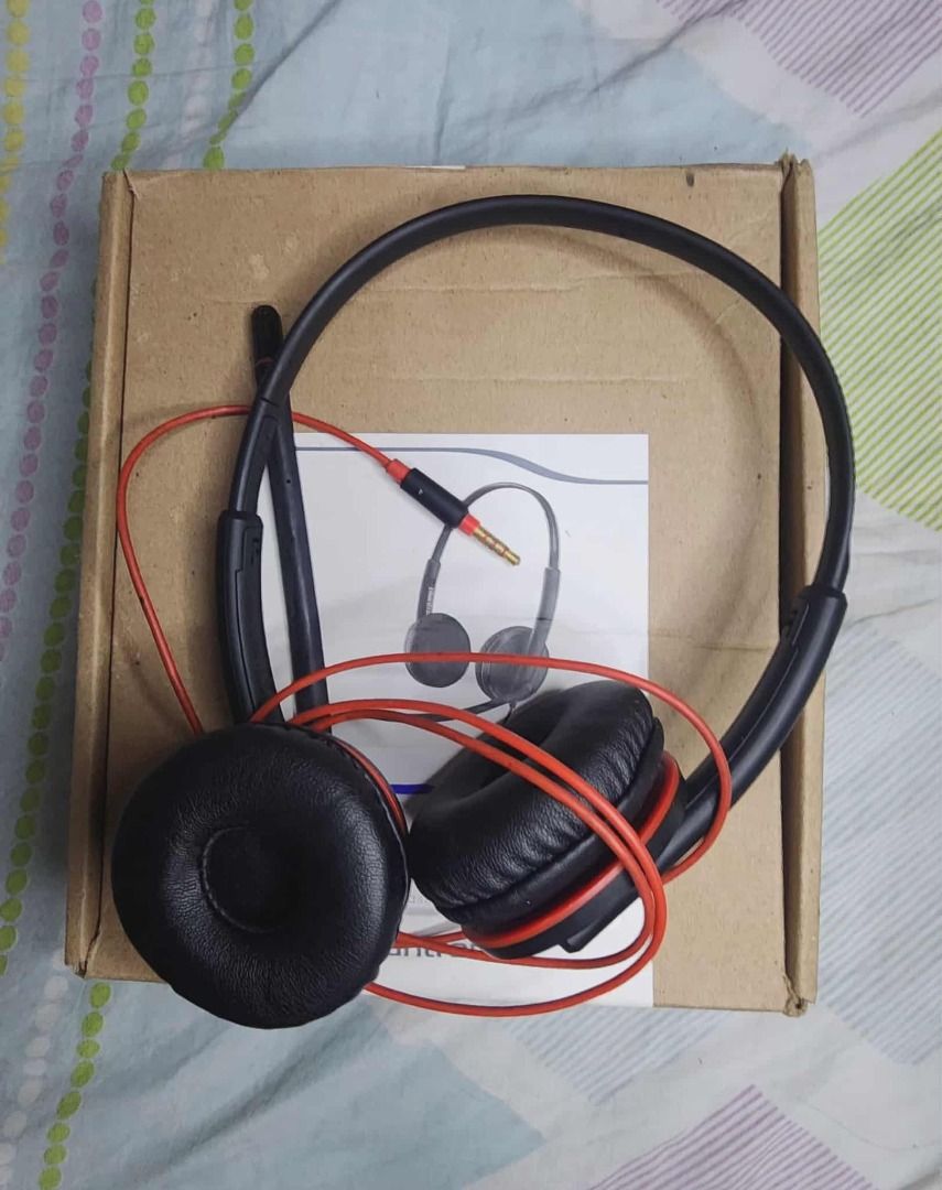 Plantronics Headset (Category: Headphones & Headsets) located in Manila. Submitted by mwnadala (Listing ID 1398345286, Image 3). Description: Features: wired stereo headset with both USB-C and 3.5mm connections, a noise-canceling microphone, and SoundGuard acoustic protection. It has on-ear speakers, a flexible microphone boom, and inline controls for call and volume management, making it compatible with PCs, tablets, and smartphones. Color: Blac