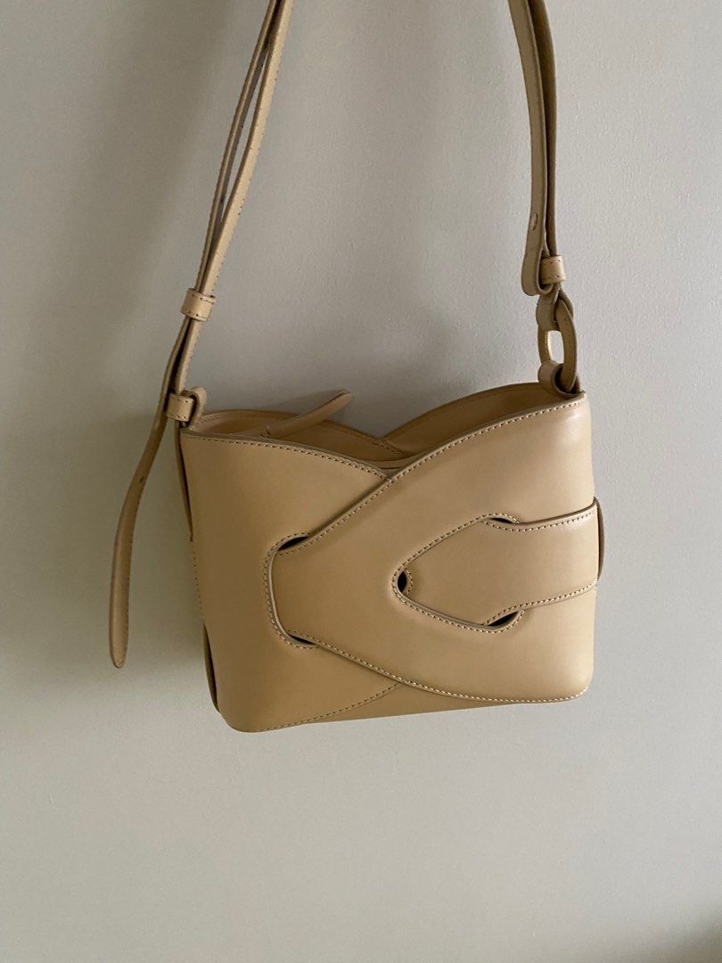 Polene nodde bag - smooth oat (Category: Luxury Bags & Wallets) located in Taguig. Submitted by timeandplace (Listing ID 1398176235, Image 1). Description: I love this bag! The leather is smooth, the color is fun. It can be a shoulder bag, and can be a crossbody bag. It can fit quite a lot. I got this last year but I am downsizing my collection but this is a really cute bag. Comes with the dustbag as I had to throw away the box for space. This is
