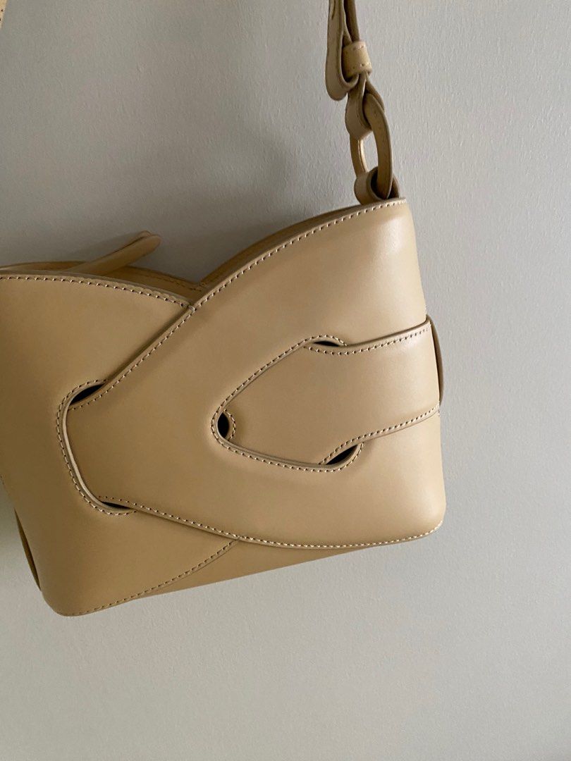 Polene nodde bag - smooth oat (Category: Luxury Bags & Wallets) located in Taguig. Submitted by timeandplace (Listing ID 1398176235, Image 2). Description: I love this bag! The leather is smooth, the color is fun. It can be a shoulder bag, and can be a crossbody bag. It can fit quite a lot. I got this last year but I am downsizing my collection but this is a really cute bag. Comes with the dustbag as I had to throw away the box for space. This is