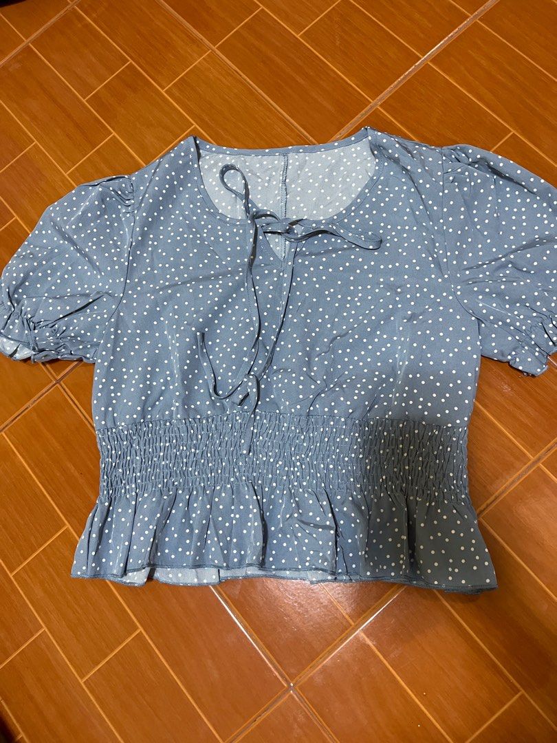 Polka Dot Blouse with Tie Detail (Category: Blouses) located in Manila. Submitted by kali_11 (Listing ID 1398228054, Image 2). Description: Polka dot blouse with tie detail, puffed sleeves, and smocked waist. Soft blue color. Versatile style..