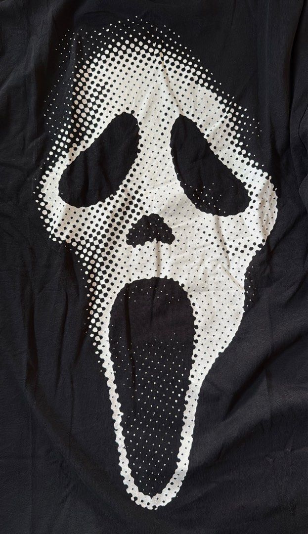 SCREAM: Ghost Face (Category: Tshirts & Polo Shirts ) located in Manila. Submitted by handpickedshirts (Listing ID 1391370319, Image 2). Description: Brand new, with hang tags with unnoticeable mending Solid black fabric Embroidered minimal front detail Crew neck Approx L29/30in, W20in, ❌W21in, ❌W23in, W26in laid flat.