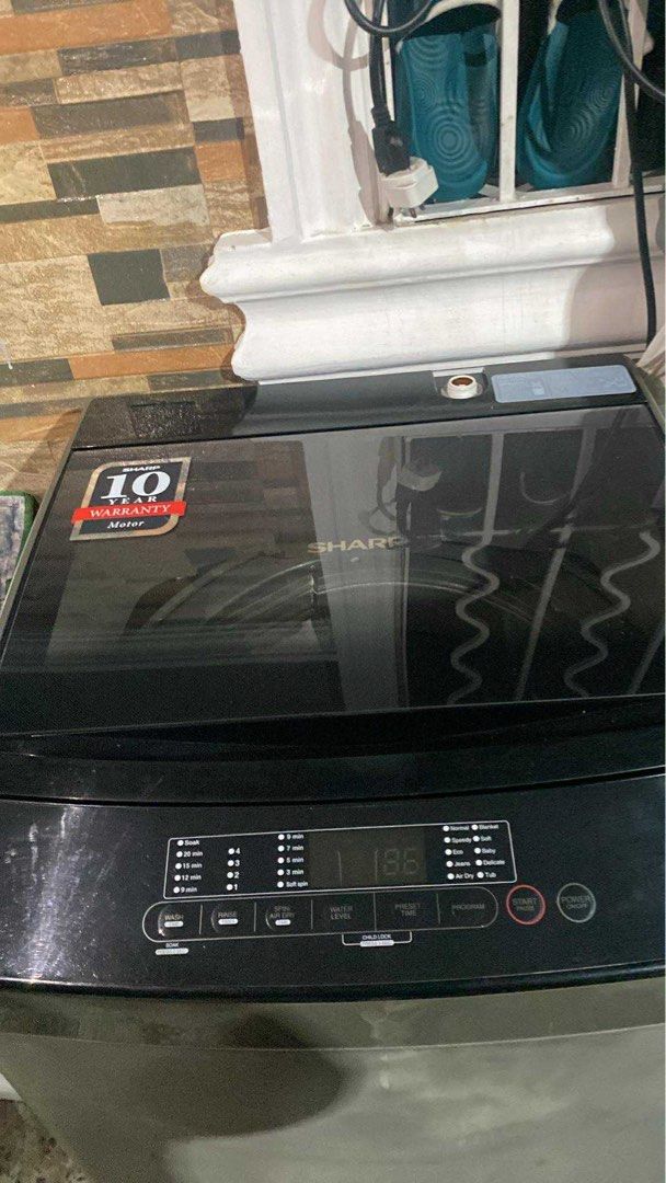 Sharp Top Load Washing Machine 8.0kg (Category: Washing Machines and Dryers) located in Mandaluyong City. Submitted by helloakiii (Listing ID 1398312594, Image 2). Description: - Sharp top load washing machine - 8.0kg capacity - Digital display - Multiple wash cycle options - Includes lint filter and hose - Black and gray exterior - 10-year motor warranty -bought last 2022 RFS: owns also a 9.0kg one which we kept in our apartment in zambales. now