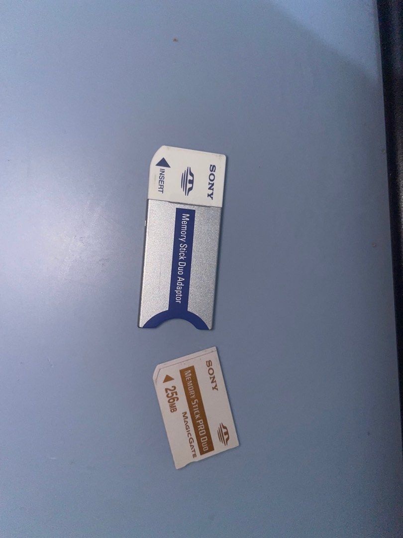 Sony Memory Stick Duo Adapter and 256MB Card (Category: Memory & SD Cards) located in Manila. Submitted by kiagonzale31041 (Listing ID 1398192106, Image 2). Description: Sony Memory Stick Duo Adapter and a 256MB Memory Stick PRO Duo MagicGate card. - 256MB capacity. - Ideal for older digital cameras and devices using Memory Stick format. - Both items are Sony branded..