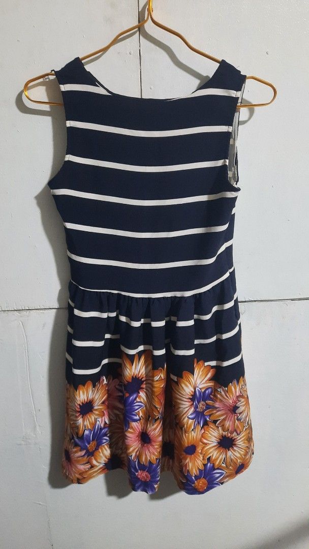 Striped Floral Dress (Category: Dresses) located in Pasay City. Submitted by hashi_ (Listing ID 1398338559, Image 1). Description: !!! ALL MUST GO !!!! PLEASE READ DESCRIPTION !! BUY 3 DRESSES FOR 250 !!! ^^ for more pics sizes and etc kindly dm me! - Black and white striped bodice - Floral print skirt - Sleeveless design - Round neckline - Lightweight fabric - Ideal for warm weather.