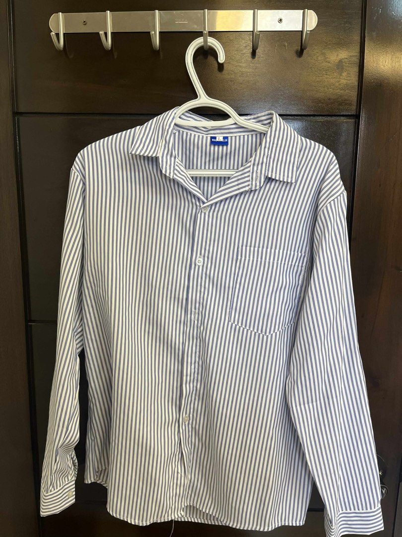 Striped Long Sleeve Shirt (Category: Tshirts & Polo Shirts ) located in Santa Rosa. Submitted by declutter.jenjen (Listing ID 1398245532, Image 1). Description: - Classic long-sleeved shirt - Vertical stripes - Collared neckline - Single chest pocket - Buttoned cuffs - Button-down front - Lightweight fabric - Ideal for warmer weather.