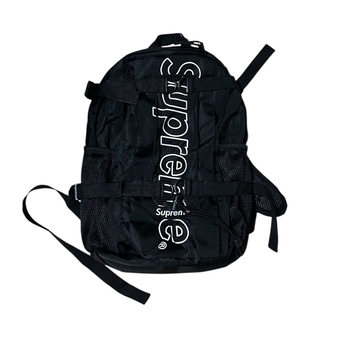 Supreme Backpack Black (Category: Backpacks) located in Manila. Submitted by luvsosa (Listing ID 1398257633, Image 1). Description: - Supreme black backpack - Features the iconic Supreme logo - Multiple compartments for storage - Adjustable straps for a comfortable fit - Breathable mesh back panel - Side pockets for extra storage - Brand new with original tags attached.