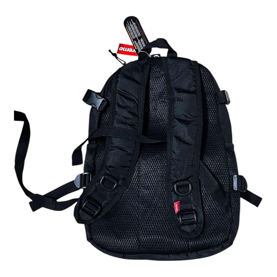 Supreme Backpack Black (Category: Backpacks) located in Manila. Submitted by luvsosa (Listing ID 1398257633, Image 2). Description: - Supreme black backpack - Features the iconic Supreme logo - Multiple compartments for storage - Adjustable straps for a comfortable fit - Breathable mesh back panel - Side pockets for extra storage - Brand new with original tags attached.