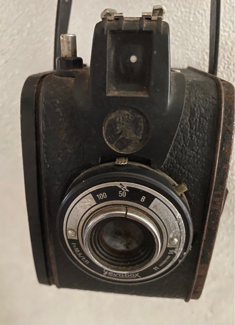 vintage camera GEVAERT GEVABOX 6x9 box camera (Category: Cameras) located in Makati City. Submitted by celebrityauctions (Listing ID 1398286558, Image 3). Description: The product shown in the image is a Gevaert Gevabox 6x9 box camera. It was a medium-format camera made for Gevaert by Hermann Wolf GmbH in Germany, starting around 1951. It takes 6x9 images on 120 film and features a fixed-focus lens and two shutter speeds. It is considered a colle