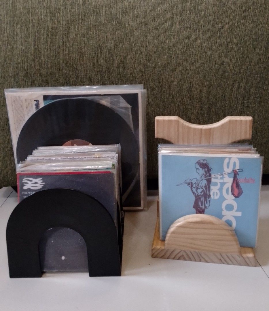 Vinyl Records Display Rack For 12" & 7" (Category: Portable Audio Accessories) located in Binangonan. Submitted by stufflikedat (Listing ID 1398193856, Image 2). Description: Vinyl records display rack for 12" & 7" (45s) wood (up to 20+ records) and sturdy black plastic material (up to 80+ 45s) both in excellent condition for 1.6k for both + shipping or delivery.