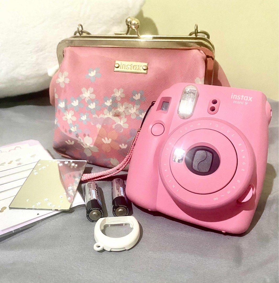 {WORKING CAM} Instax Mini Sakura Kit (Category: Cameras) located in Binan City. Submitted by randomsecondhandthings (Listing ID 1398233508, Image 2). Description: Original Price: ~5,000 INCLUDES: • Instax Mini (Pink) • Sakura Mirror • Used Stickers & Envelopes •Instax Purse (slightly faded and stained) Message me for more pictures or details. No COD unless meetup. Accepting GCash! .