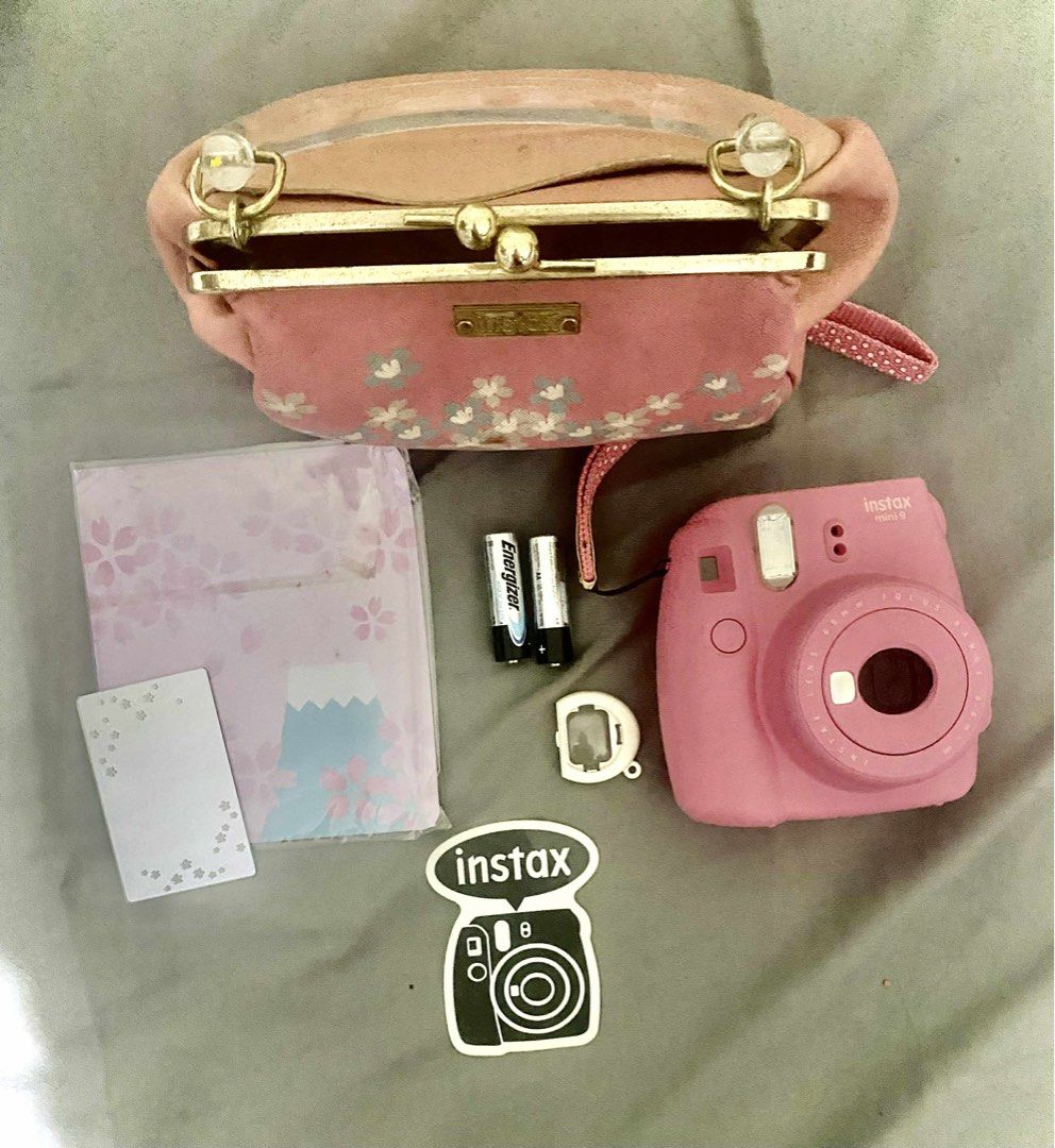 {WORKING CAM} Instax Mini Sakura Kit (Category: Cameras) located in Binan City. Submitted by randomsecondhandthings (Listing ID 1398233508, Image 3). Description: Original Price: ~5,000 INCLUDES: • Instax Mini (Pink) • Sakura Mirror • Used Stickers & Envelopes •Instax Purse (slightly faded and stained) Message me for more pictures or details. No COD unless meetup. Accepting GCash! .