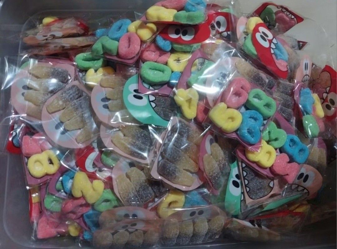 Assorted Gummy Candies (Category: Other Food & Drinks) located in Abucay. Submitted by g_treasures (Listing ID 1398355133, Image 1). Description: - Variety of colorful gummy candies. - Includes gummy numbers, bears, sushi, and cola bottle shapes. - Each candy is individually packaged. - Perfect for sharing or enjoying alone. - A sweet treat for any occasion!.
